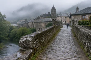 Ponte medieval e vilarejo antigo, cenário dos peregrinos medievais do Caminho de Santiago