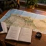 Mapa do norte da Espanha, credencial do peregrino e caderno de rota para planejar o Caminho de Santiago