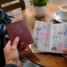 Passaporte e credencial do peregrino, documentos ao lado do seguro viagem no Caminho de Santiago