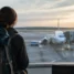 Peregrino no aeroporto na volta para casa depois do Caminho de Santiago